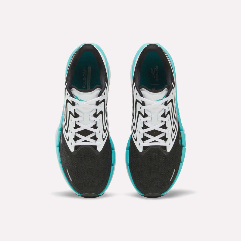 A pair of black Reebok Men's FloatZig Tread Running Shoes with white and teal accents, seen from above, highlights laces and a cushioned midsole—ideal for treadmill workouts against a plain white background.