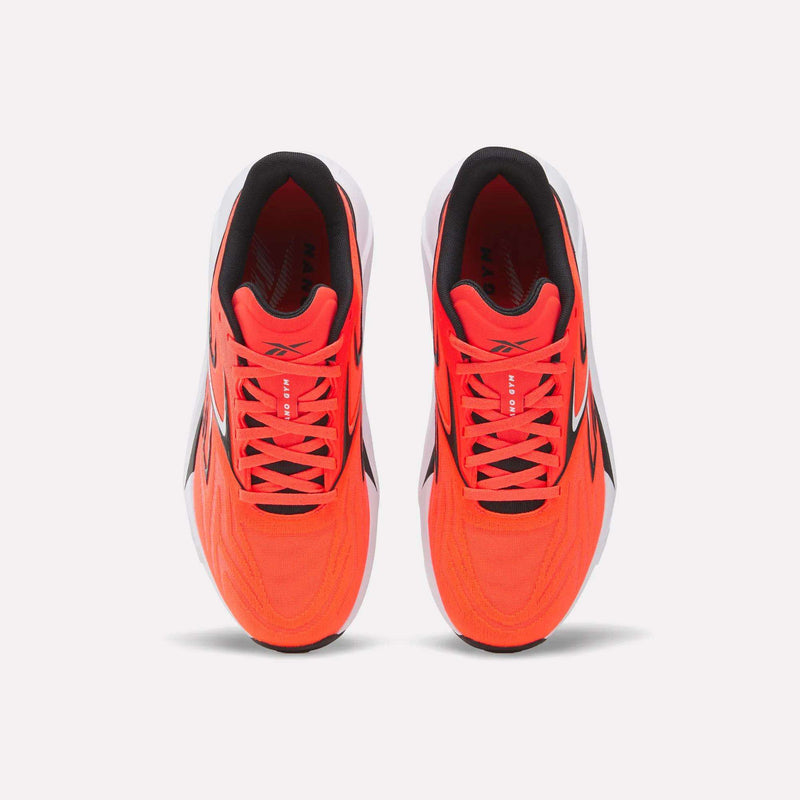 Top view of Reebok Nano Gym 2.0 Training Shoes in bright red with white soles, black and white accents, high-rebound foam, and red laces, displayed side by side on a plain white background.
