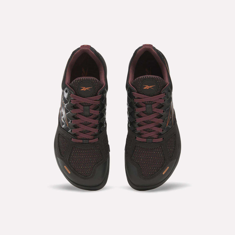 A pair of Reebok Women’s Nano 2.0 Training Shoes in black with maroon accents and laces, displayed from an overhead perspective to highlight the tops and tongues of both shoes against a white background—perfect for functional fitness routines.
