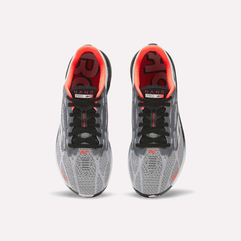 A pair of Reebok Nano Pro Training Shoes in gray and black with red inner linings and NANO branding on the insoles, shown from above against a white background—ideal for athletes aiming for peak performance.