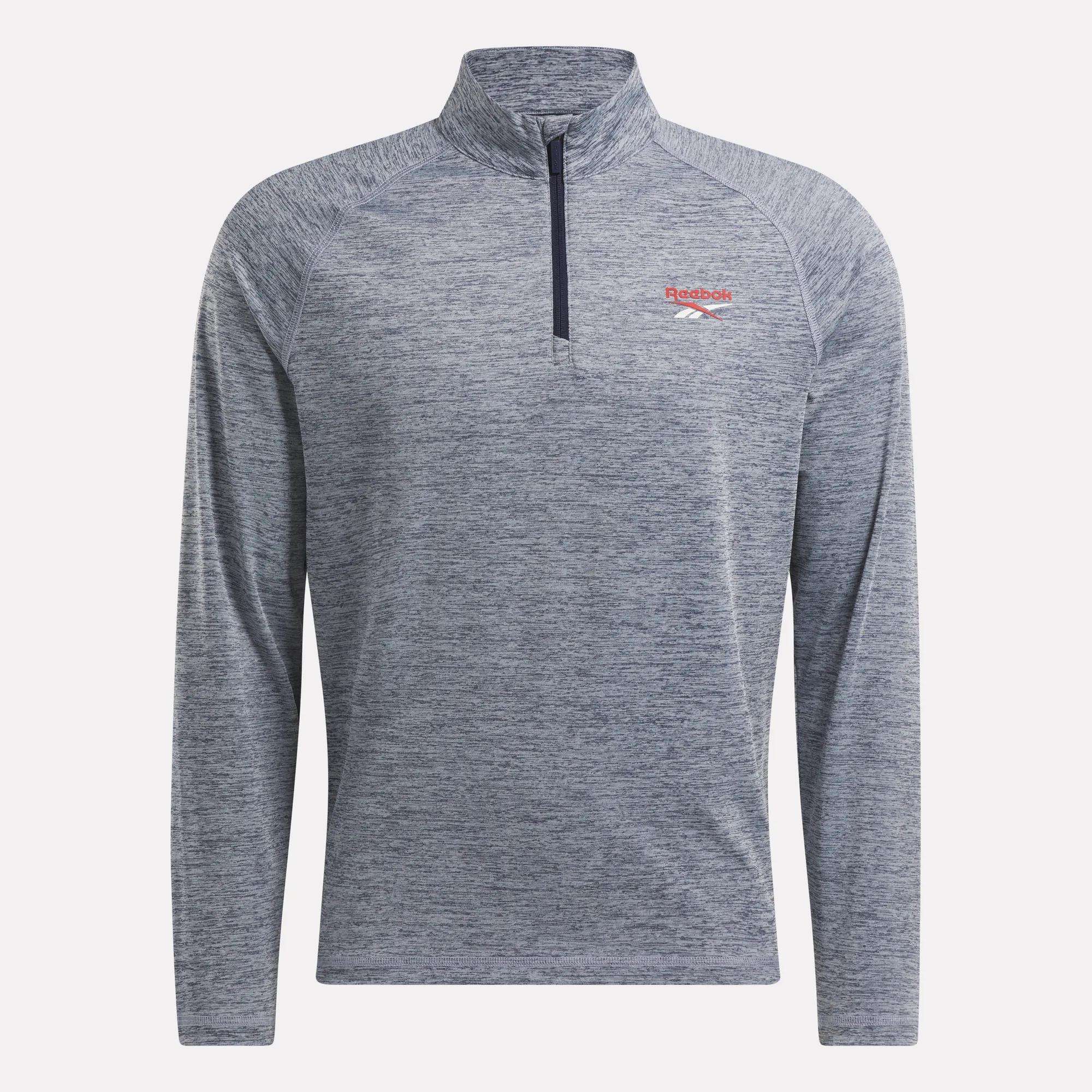 The Reebok Men's Cationic Wicking Quarter-Zip Sweatshirt in heather gray features RBK-DRY tech, a stand-up collar, red embroidered logo, and slim fit—offering style and comfort for athletic or casual wear.