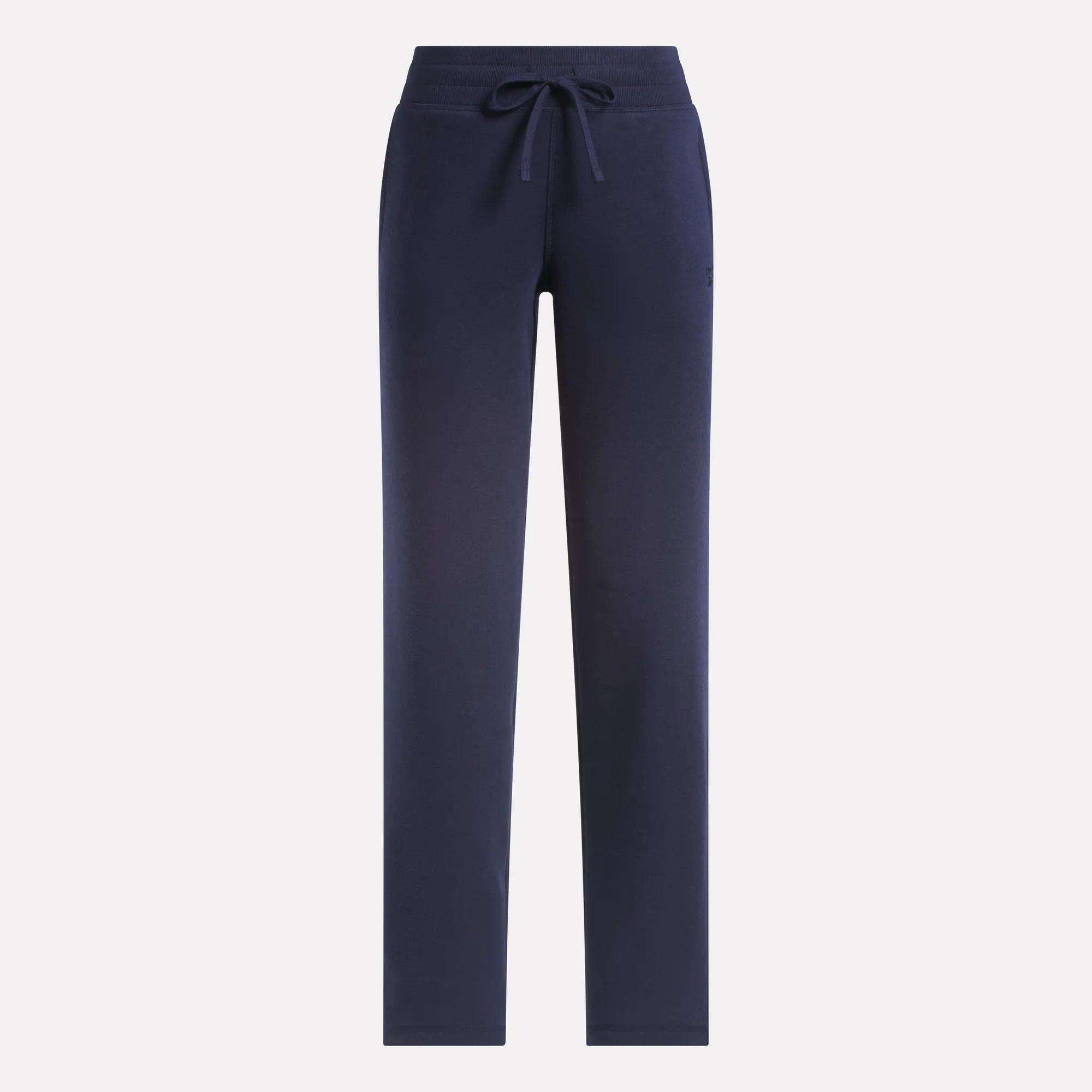 Reebok Women's Cozy Classic Sweatpants in navy blue, featuring a straight-leg fit, soft cotton blend fabric, elastic waistband, and drawstring. Shown on a plain white background.
