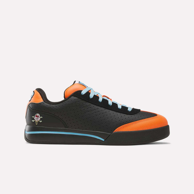 Black and orange Reebok x Icecream Board Flip low-top suede sneakers with light blue laces and a small ice cream cone graphic on the heel.