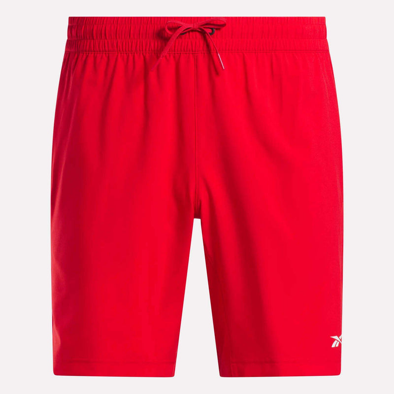 Reebok Men's Woven Shorts in bright red feature an elastic waistband, adjustable drawstring, sweat-wicking fabric, and a small white logo on the lower left leg. Perfect for workouts. Displayed against a plain white background.