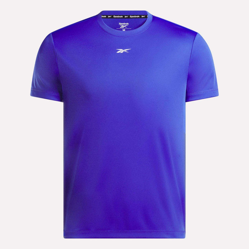 The Men's Short Sleeve Tech Training T-Shirt by Reebok is shown in royal blue with a classic crew neckline, sweat-wicking fabric, and the white Reebok logo at the chest, set against a white background.