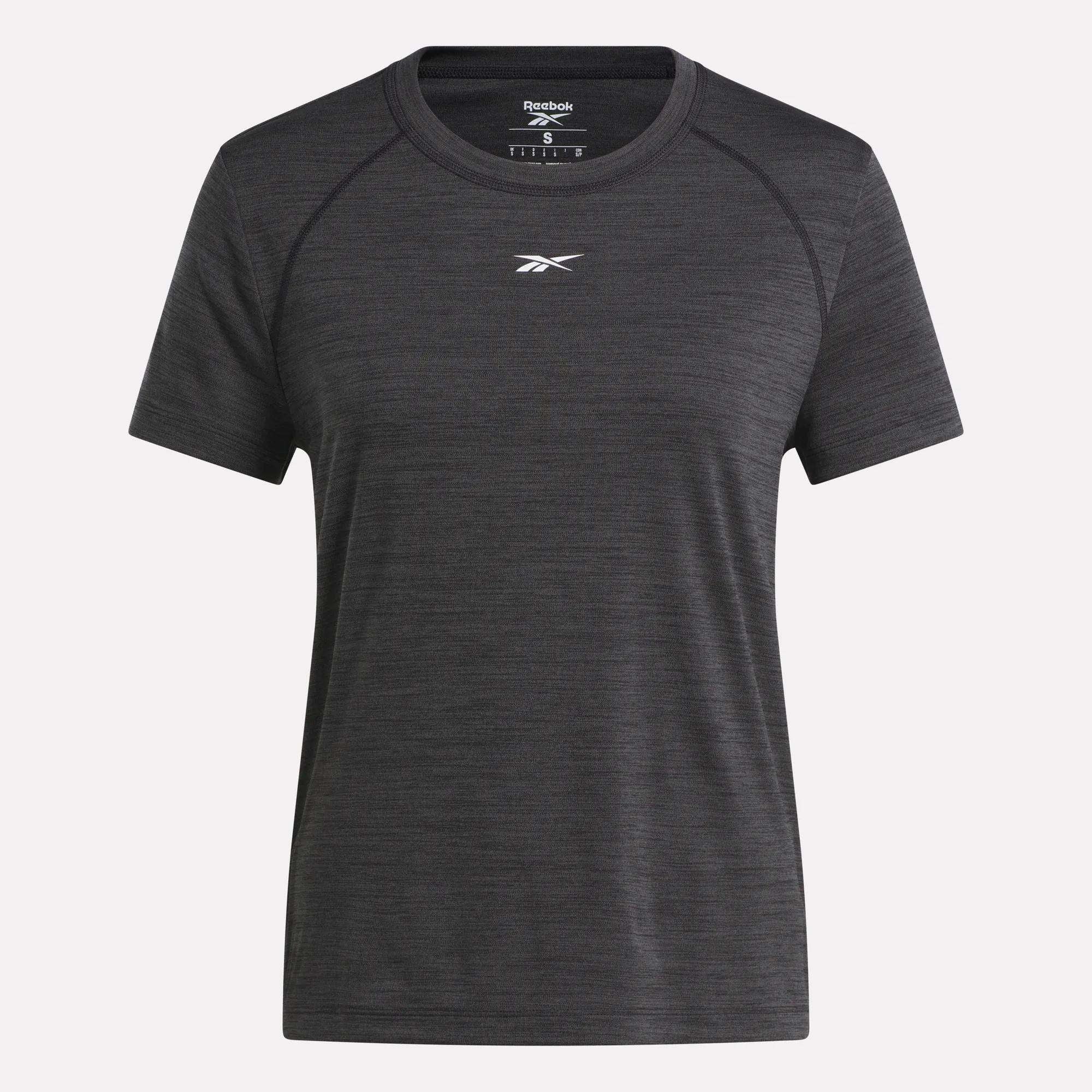 A women's Reebok Training T-Shirt in dark grey is shown on a white background. This short-sleeved tee has a crew neckline and features a small white Reebok logo on the chest.