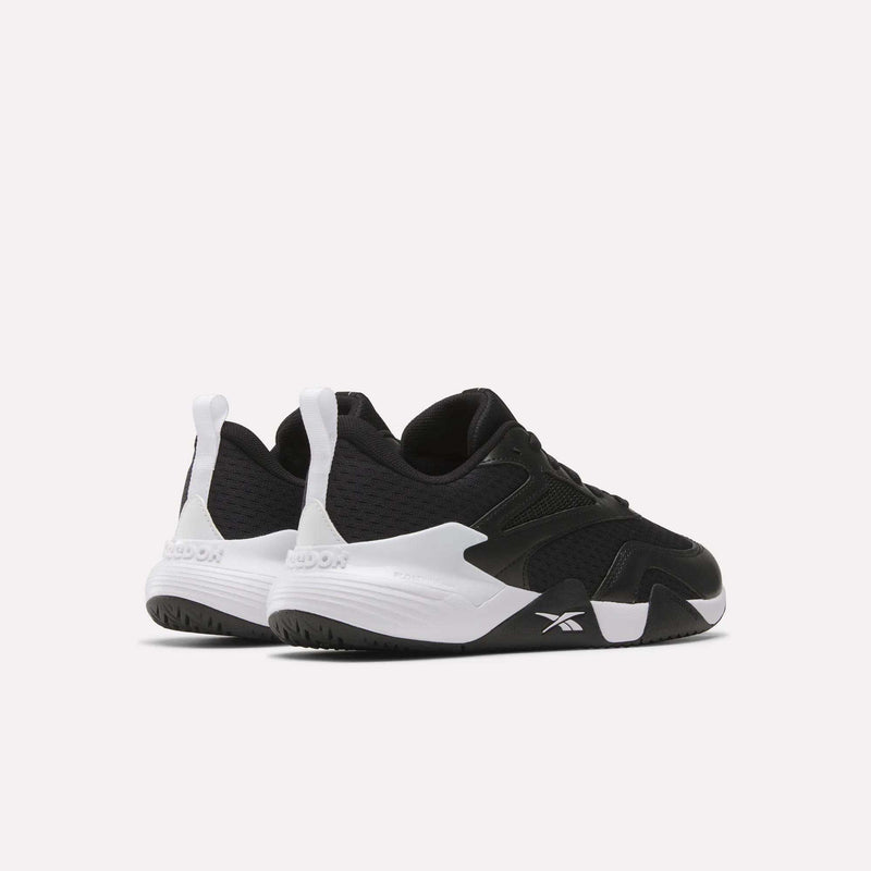 Men’s Phase Advantage Tennis Shoes by Reebok with lightweight black uppers, white midsoles, and black outsoles.