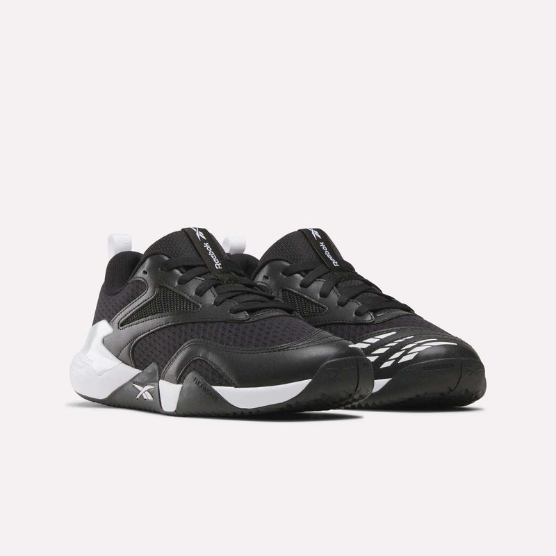 Black Reebok Men’s Phase Advantage tennis shoes featuring white soles, black laces, and a white geometric pattern on the side.
