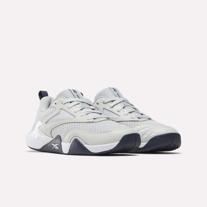 Light gray Men’s Phase Advantage Tennis Shoes with a low-top silhouette, white midsole, and dark blue outsole.