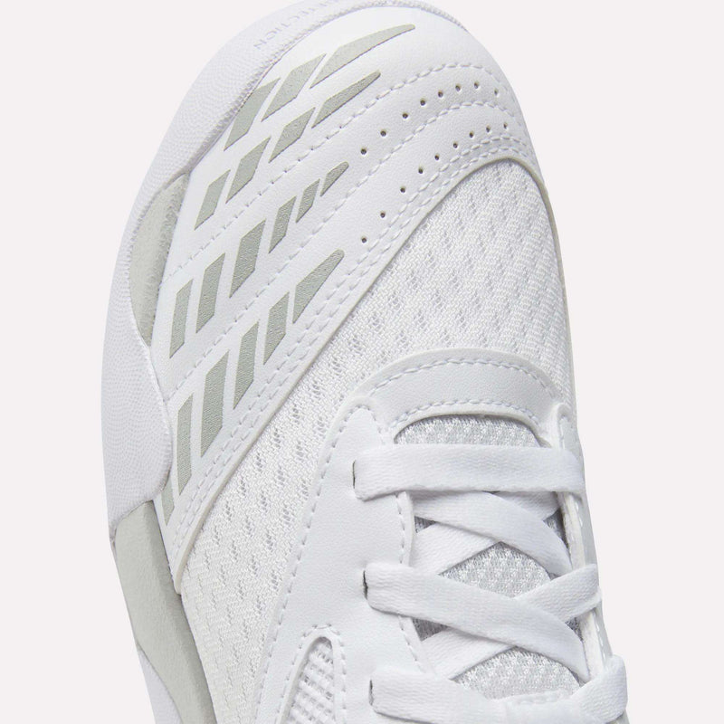 Close-up of the toe and laces of white Reebok Men’s Phase Advantage Tennis Shoes featuring grey diagonal accents.