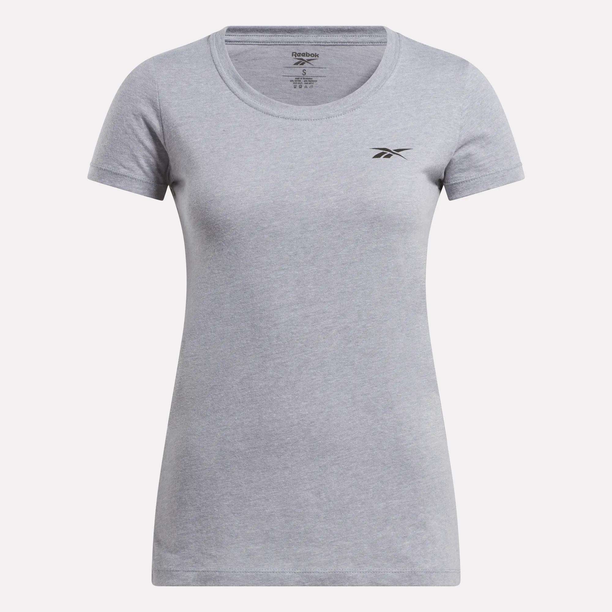 The Women's Reebok T-Shirt is a light gray cotton tee with short sleeves, a round neck, and a small black Reebok logo on the left chest, shown on a plain white background.