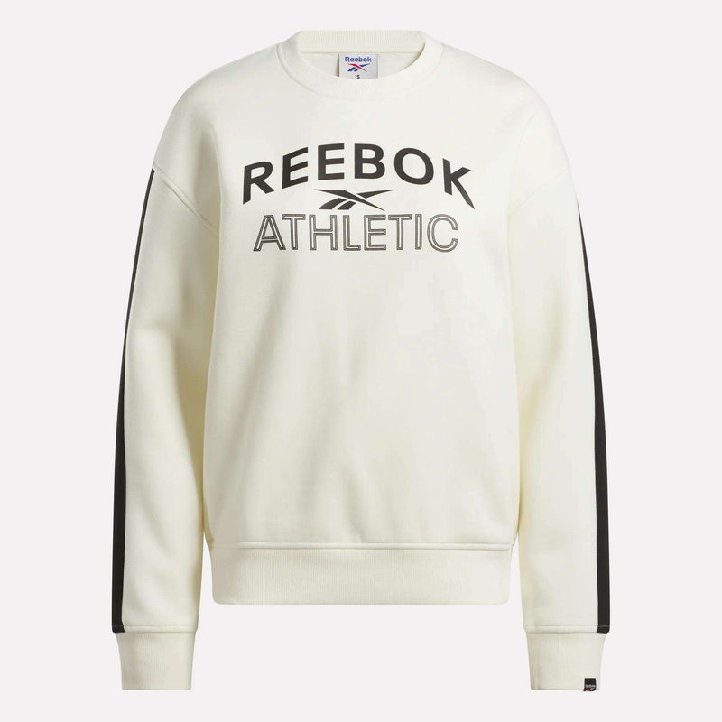 The Reebok Women's Fleece Crew Sweatshirt features black REEBOK ATHLETIC text and logo on the front, black stripes down both sleeves, and is made from soft brushback fleece for a cozy feel. Color: white.