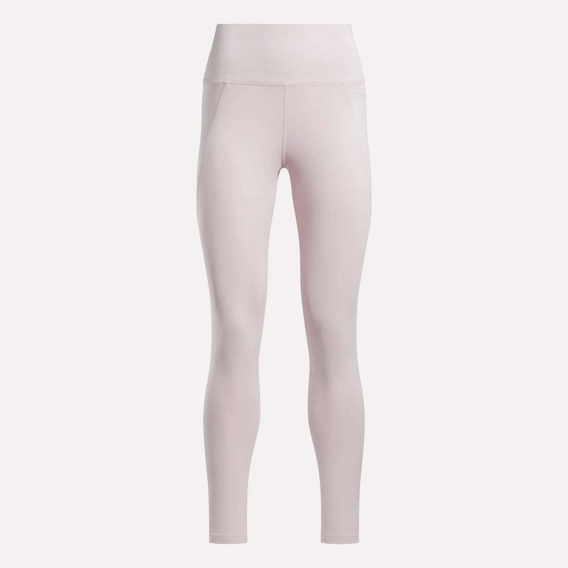 Light pink Reebok Women's High-Rise Leggings constructed from RBK-DRY performance fabric, featuring a smooth, seamless design and fitted, full-length silhouette with no visible branding. Shown against a plain white background.