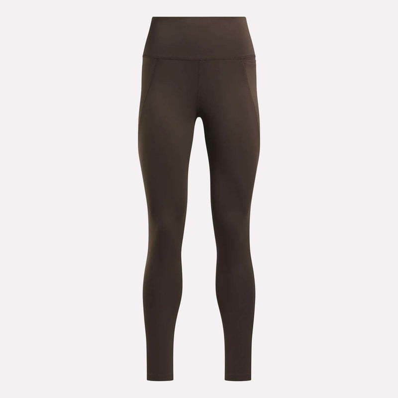 Reebok Women’s High-Rise Leggings in dark brown, made with RBK-DRY performance fabric for training, shown full-length against a plain light background.