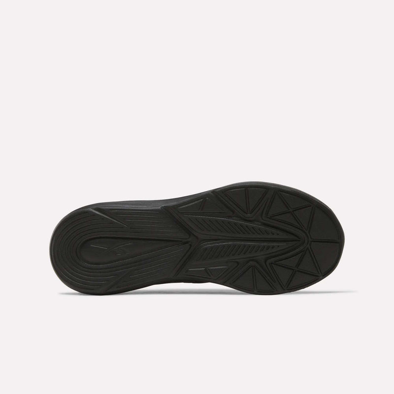 The black rubber sole of the Reebok Rush Runner 6.0 Running Shoes - Big Kids features a geometric tread pattern and EVA midsole, shown from the bottom against a plain white background.