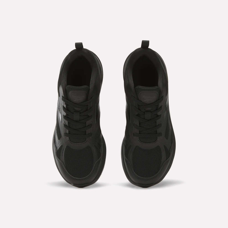Top view of Reebok Rush Runner 6.0 Running Shoes for Big Kids, black with mesh and synthetic panels, black laces, EVA midsole, and heel pull tabs, placed side by side on a light background.