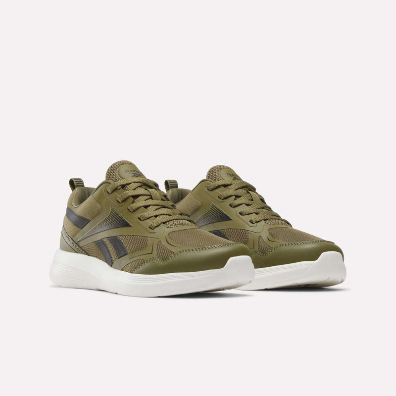 A pair of Reebok Rush Runner 6.0 Running Shoes for big kids in olive green, featuring white soles, black and darker green side stripes, breathable mesh panels, an EVA midsole for enhanced comfort, and matching green laces, shown against a plain white background.