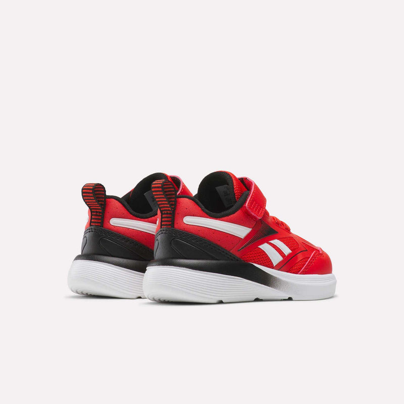 The Reebok Rush Runner 6.0 Gore Lace Top Strap Running Shoes for babies and toddlers feature red and black uppers, white soles, side stripes, EVA cushioning, and are shown from back and side angles on a plain white background.