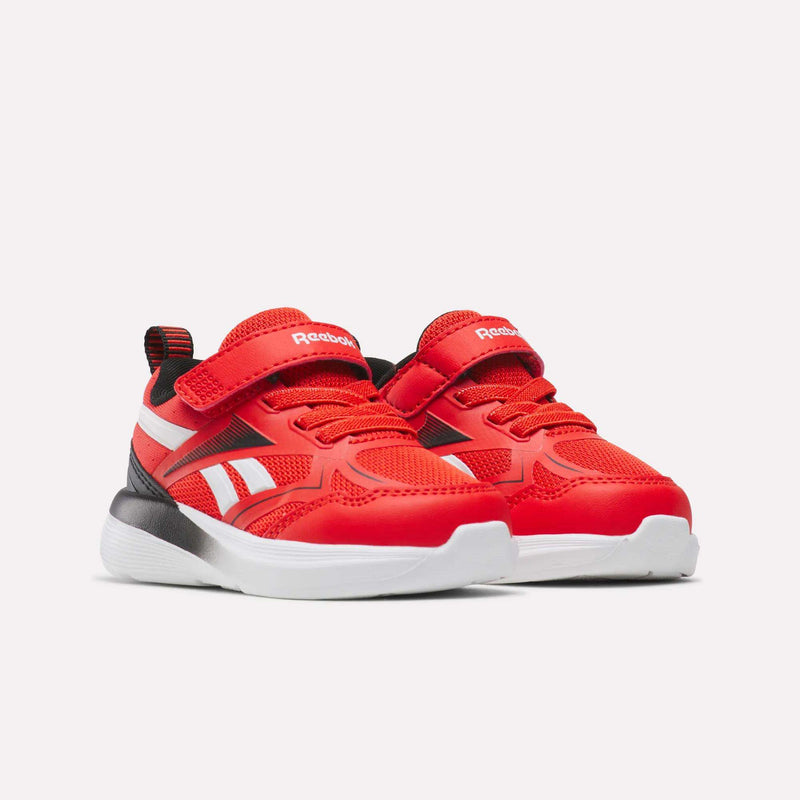 The Reebok Rush Runner 6.0 Gore Lace Top Strap Running Shoes for babies and toddlers feature a bright red design with white accents, velcro straps, and cushioned EVA soles, shown against a plain light background.