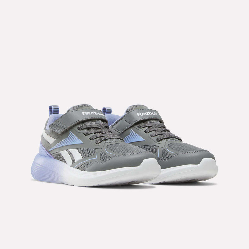 A pair of Reebok Rush Runner 6.0 Elastic Lace Top Strap Running Shoes for little kids in gray and lavender with white soles and Velcro straps, designed for all-day comfort, displayed on a light background.
