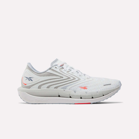 Reebok Women's FloatZig Tread Running Shoes in Ftwr White/Tranquil Blue/Neon Cherry feature a breathable mesh upper, lace-up design, logo detail, and cushioned sole—ideal for treadmill workouts.