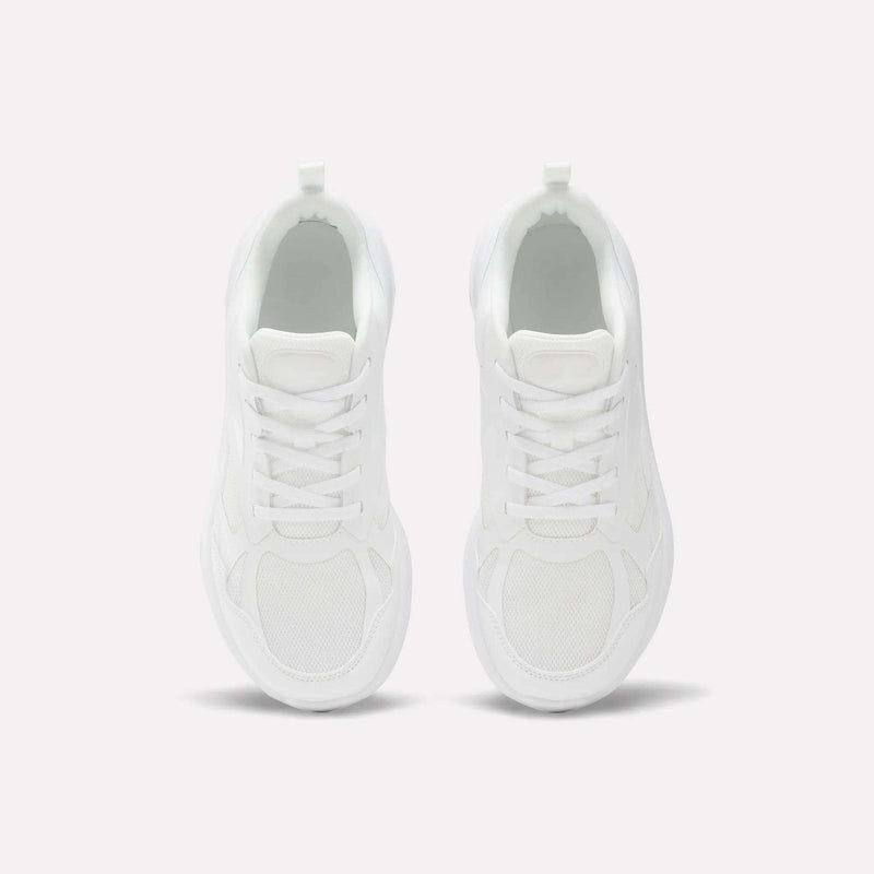 Top view of Reebok Rush Runner 6.0 Running Shoes for big kids, in clean white with white laces, minimalist design, and EVA midsole, placed side by side on a light background.
