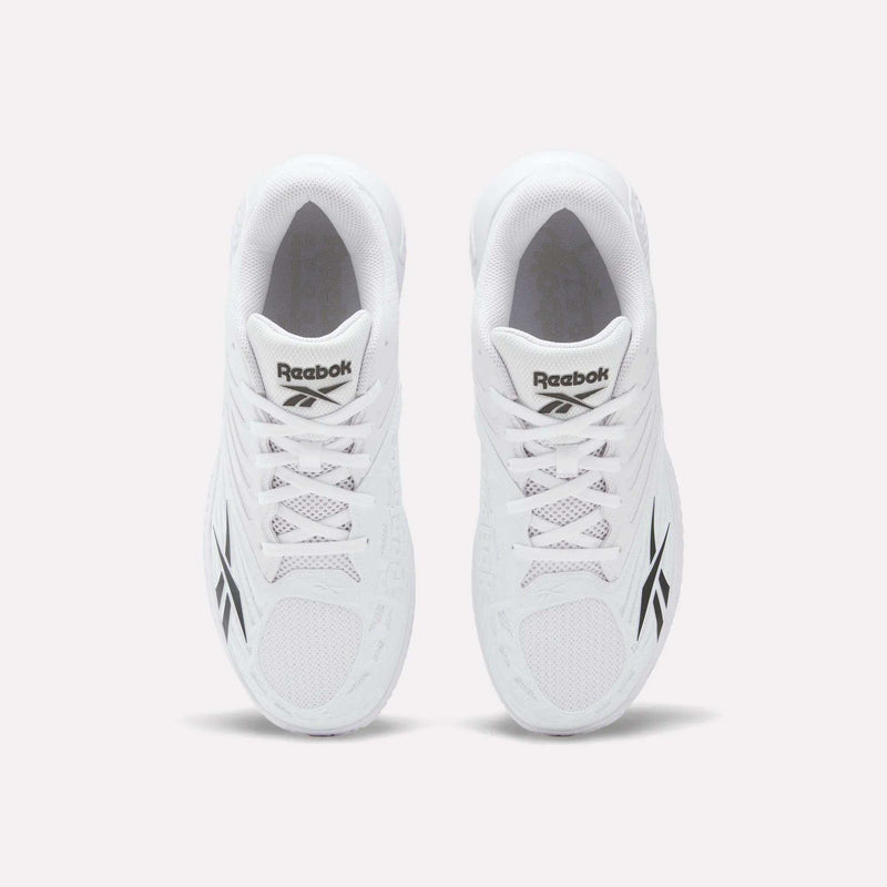 Top view of a pair of Reebok Phase EVO Tennis Shoes in white with black Reebok logos on the sides and tongue, displayed side by side on a plain white background.