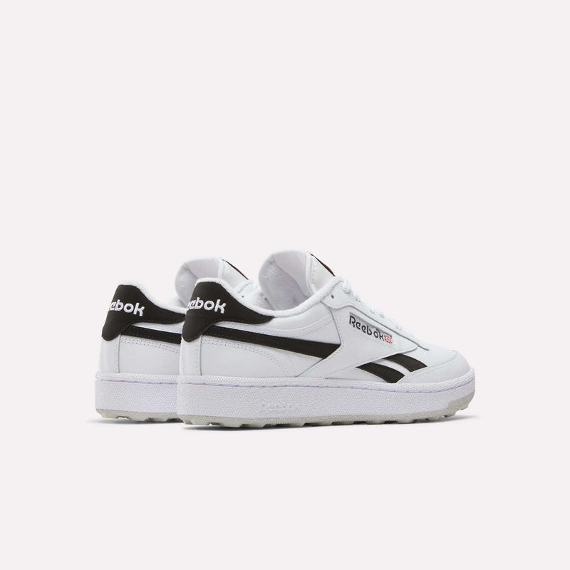 Reebok Men’s Club C Revenge Golf Shoes in white with black accents and a spikeless, water-resistant outsole.