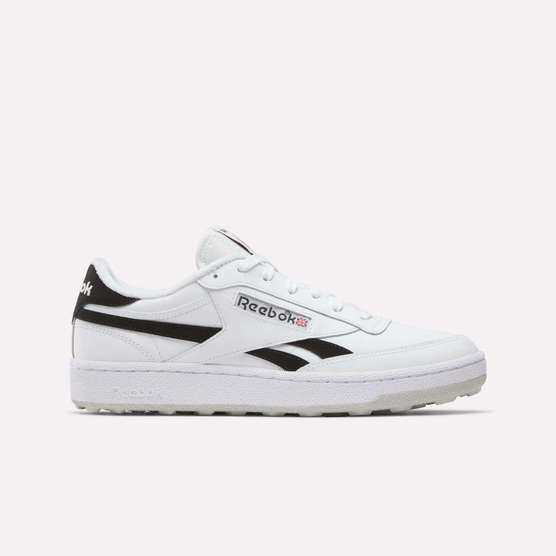 Reebok Men’s Club C Revenge Golf Shoes in white and black: water-resistant low-top sneakers with side stripes, branding on the quarter panel and heel tab, and a textured, spikeless rubber outsole.