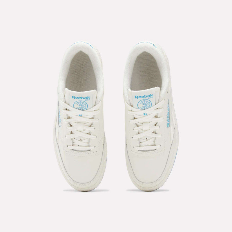 A pair of Women’s Club C Revenge Golf Shoes by Reebok, in white with blue logos, are shown side by side from a top view on a light background.