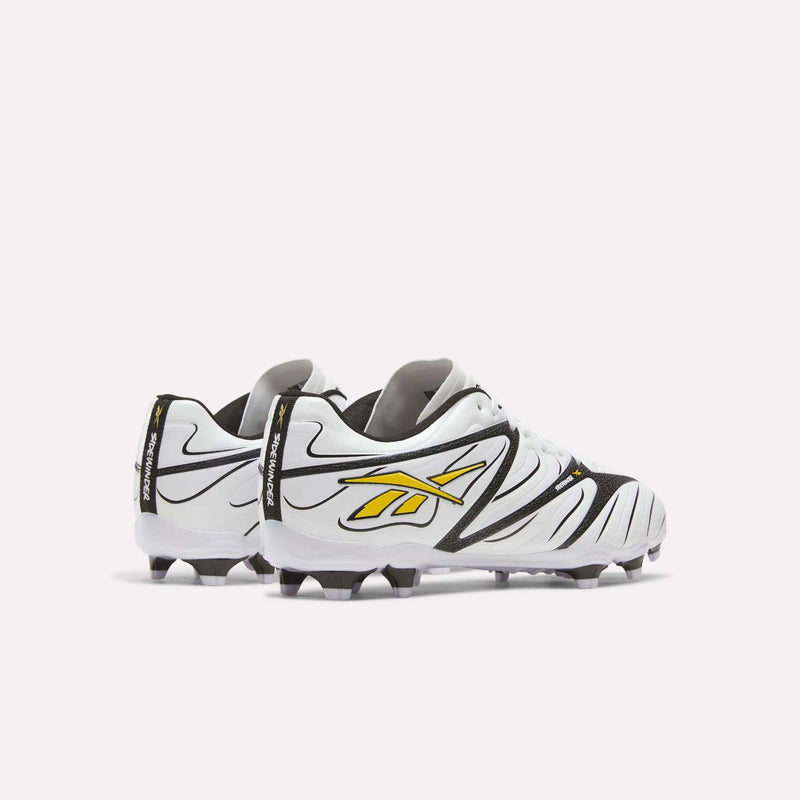 Two white and black Reebok Sidewinder 26 League Firm Ground Cleats with yellow logos, designed for enhanced ball control.