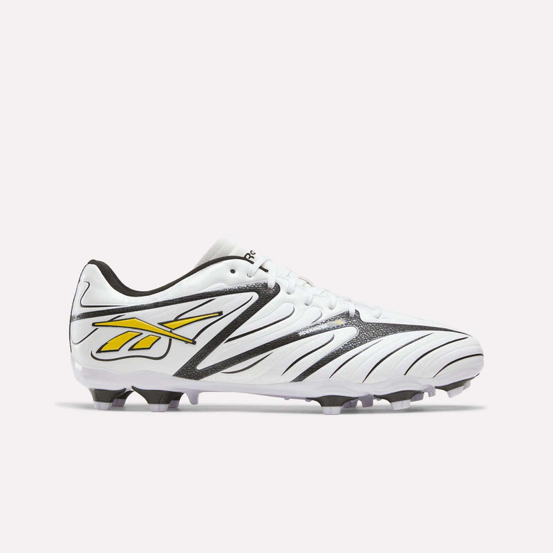 Reebok Sidewinder 26 League Firm Ground Cleats in white with black accents and a yellow logo on the side, designed for firm ground.