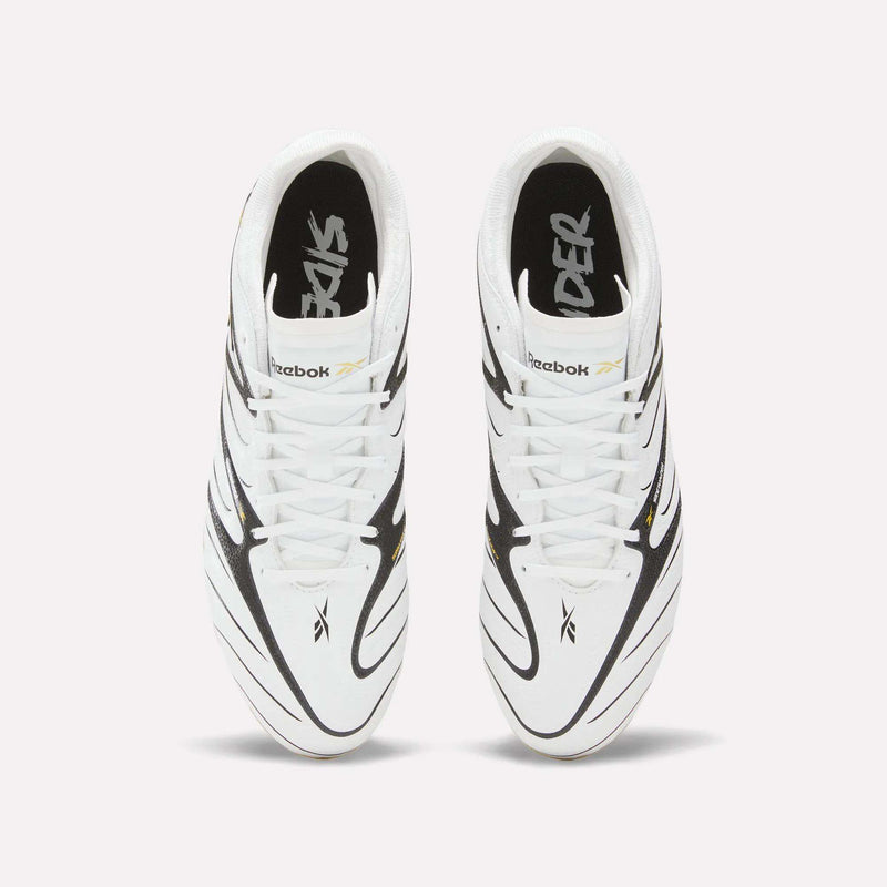A pair of Reebok Sidewinder 26 Pro Firm Ground Cleats in white with black and gold accents, seen from above on a plain background. Inspired by classic soccer cleats made for ball control on firm ground, the insoles feature the word “SIDER” in a stylized font.