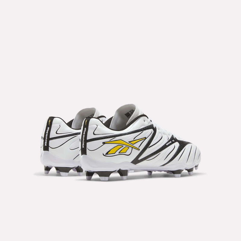 White Sidewinder 26 League Firm Ground Cleats by Reebok with black accents and a yellow logo.