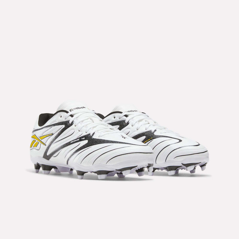 Pair of white Reebok Sidewinder 26 League Firm Ground Cleats with black accents and a yellow logo.