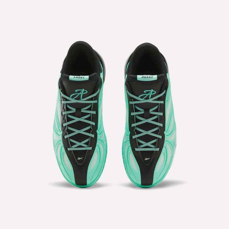Top view of a pair of Reebok Angel Reese 1 Basketball Shoes in teal and black with patterned laces, showcasing a distinctive wavy design, Energy Return System technology, and logo details on the tongues.