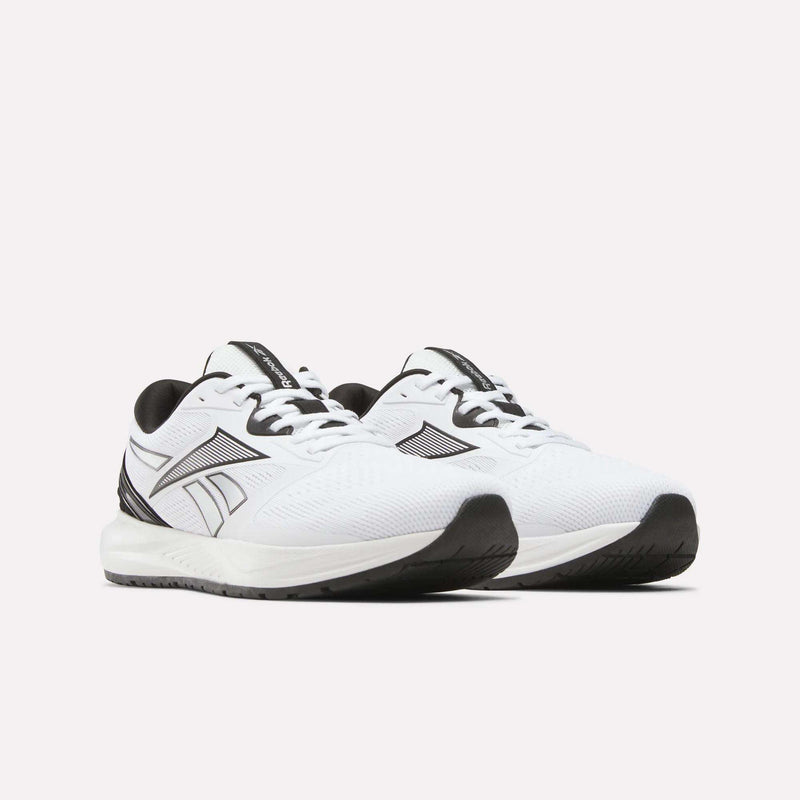 A pair of Reebok Men's Nanoflex 2 Training Shoes in white, highlighted by black accents, breathable mesh uppers, sturdy black soles, and a signature black Reebok logo on the sides—ideal for workouts—displayed against a light background.