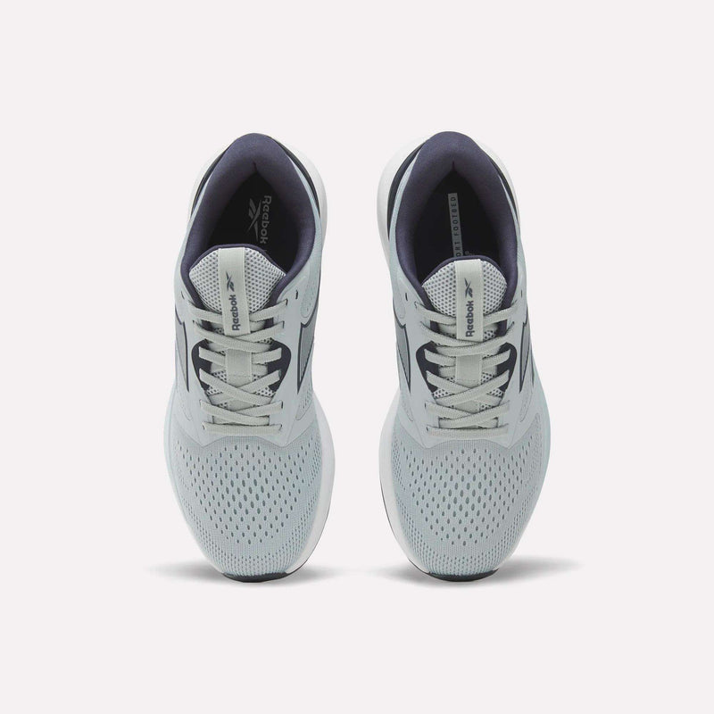 A pair of Reebok Women’s NFX Trainer 2 Training Shoes in light gray, featuring white laces and a dark interior lining, viewed from above on a plain white background.