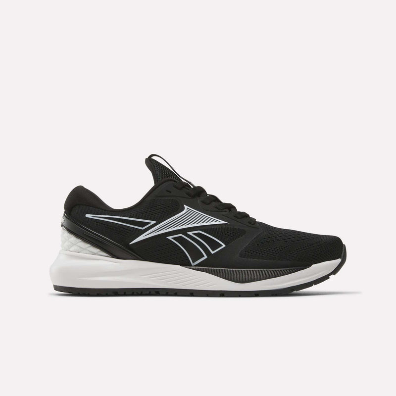The Reebok Women’s NFX Trainer 2 Training Shoes feature a black mesh upper, white sole, and a silver Reebok logo on the side. Shown against a plain white background, these versatile training shoes are perfect for daily gym sessions or intense workout routines.