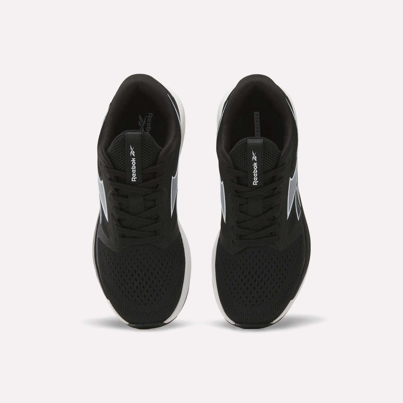 A pair of Women’s NFX Trainer 2 Training Shoes by Reebok in black, viewed from above, featuring mesh uppers, white soles, and Reebok logos on the tongues and sides. The training shoes are placed side by side on a plain white background.