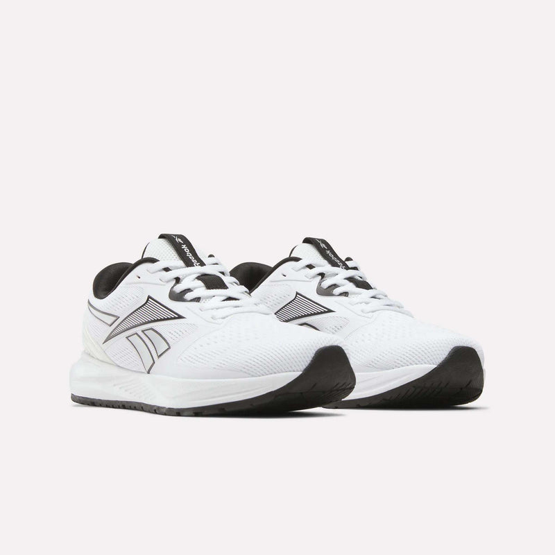 The Reebok Women's Nanoflex 2.0 Training Shoes in white feature black accents and a black side logo, displayed on a plain white background—ideal for stylish workouts or gym training sessions.