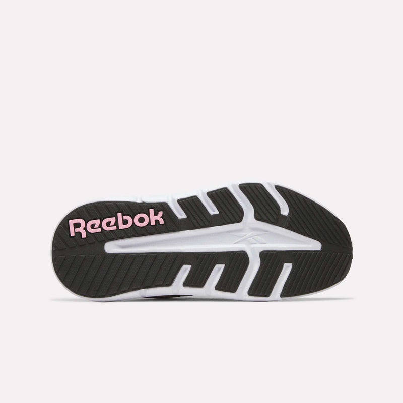 The Women's Nano Gym 2.0 Training Shoes by Reebok have a black and white tread pattern on the sole, with "Reebok" in pink lettering near the heel.