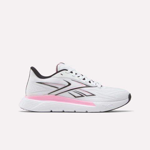 Side view of the Reebok Women's Nano Gym 2.0 Training Shoes in White/Black, showing a lace-up design and low-cut profile with black accents. The midsole features a pink gradient, while the outsole stays mostly white.