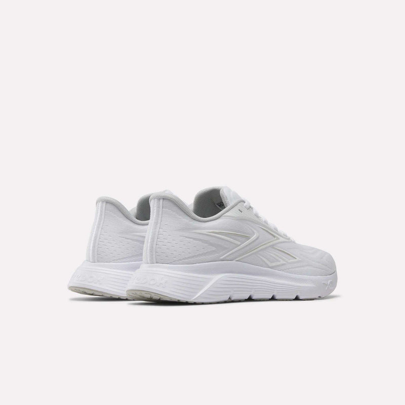 A pair of Reebok Women's Nano Gym 2.0 Training Shoes in white, featuring subtle textured patterns and a grey interior, displayed side by side on a light background from back and side views—ideal for your next workout.