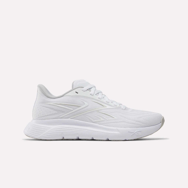 The Reebok Women's Nano Gym 2.0 Training Shoes in White/New Grey 1/White feature a textured sole, lace-up design, and subtle side logo, shown against a plain white background.