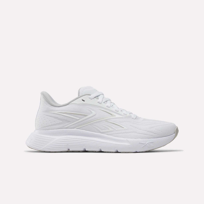 The Reebok Women's Nano Gym 2.0 Training Shoes in White/New Grey 1/White feature a textured sole, lace-up design, and subtle side logo, shown against a plain white background.