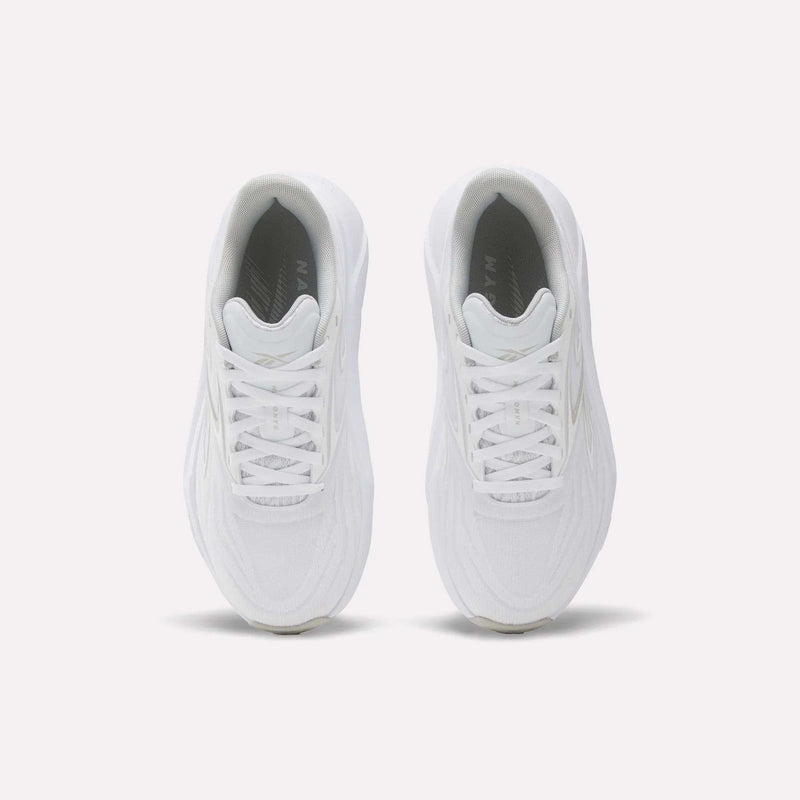 The Reebok Women's Nano Gym 2.0 Training Shoes are shown from above, featuring white laces and textured uppers against a plain white background—ideal for versatile workouts.