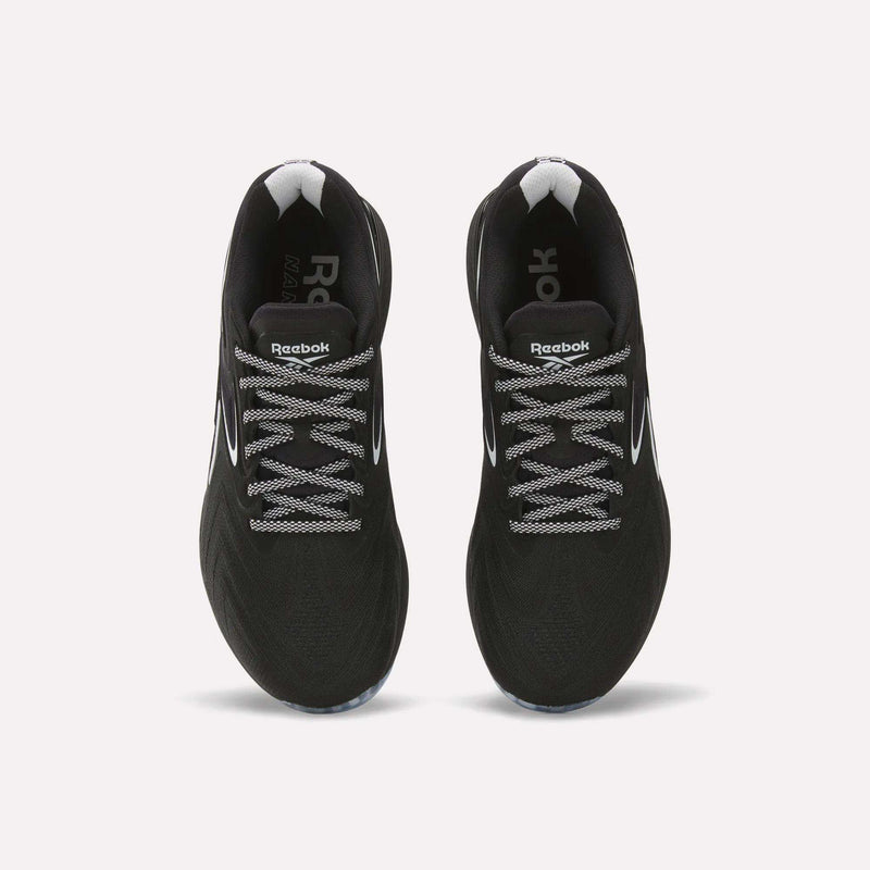 Top view of Reebok Nano X5 Edge Training Shoes—black with white accents and patterned laces—side by side on a light background, built for peak performance.