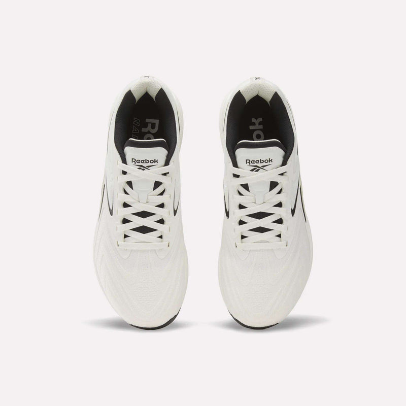 A pair of Reebok Nano X5 Edge Training Shoes in white with black accents, seen from above against a plain white background. These sneakers have white laces, display the Reebok logo on the tongue and insoles, and are constructed with flexweave material for enhanced durability—characteristic of these precision training shoes by Reebok.