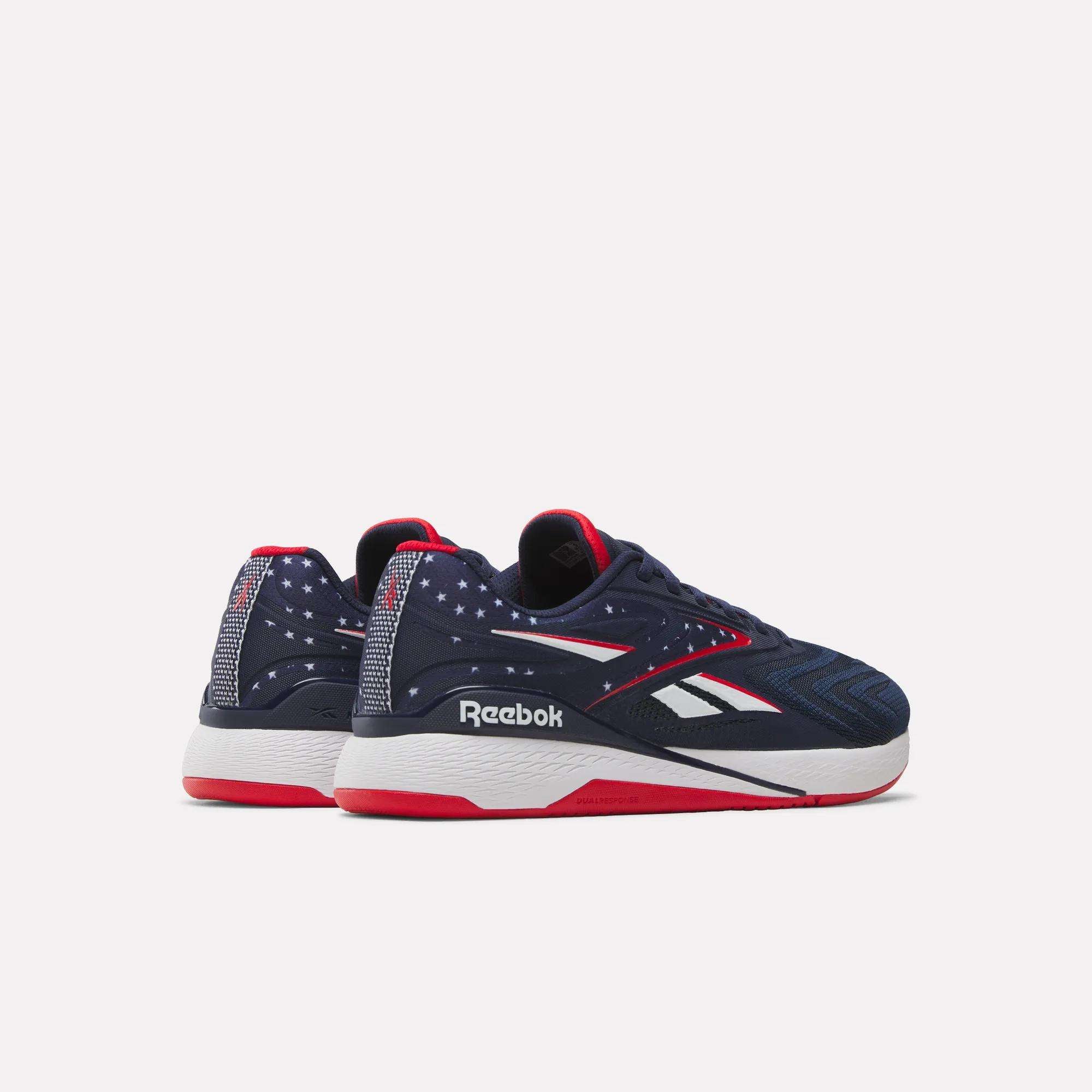 A pair of Reebok Nano X5 Edge Training Shoes with a durable Flexweave upper in navy blue, white, and red, featuring white stars on the heel and a red outsole, shown against a plain white background.